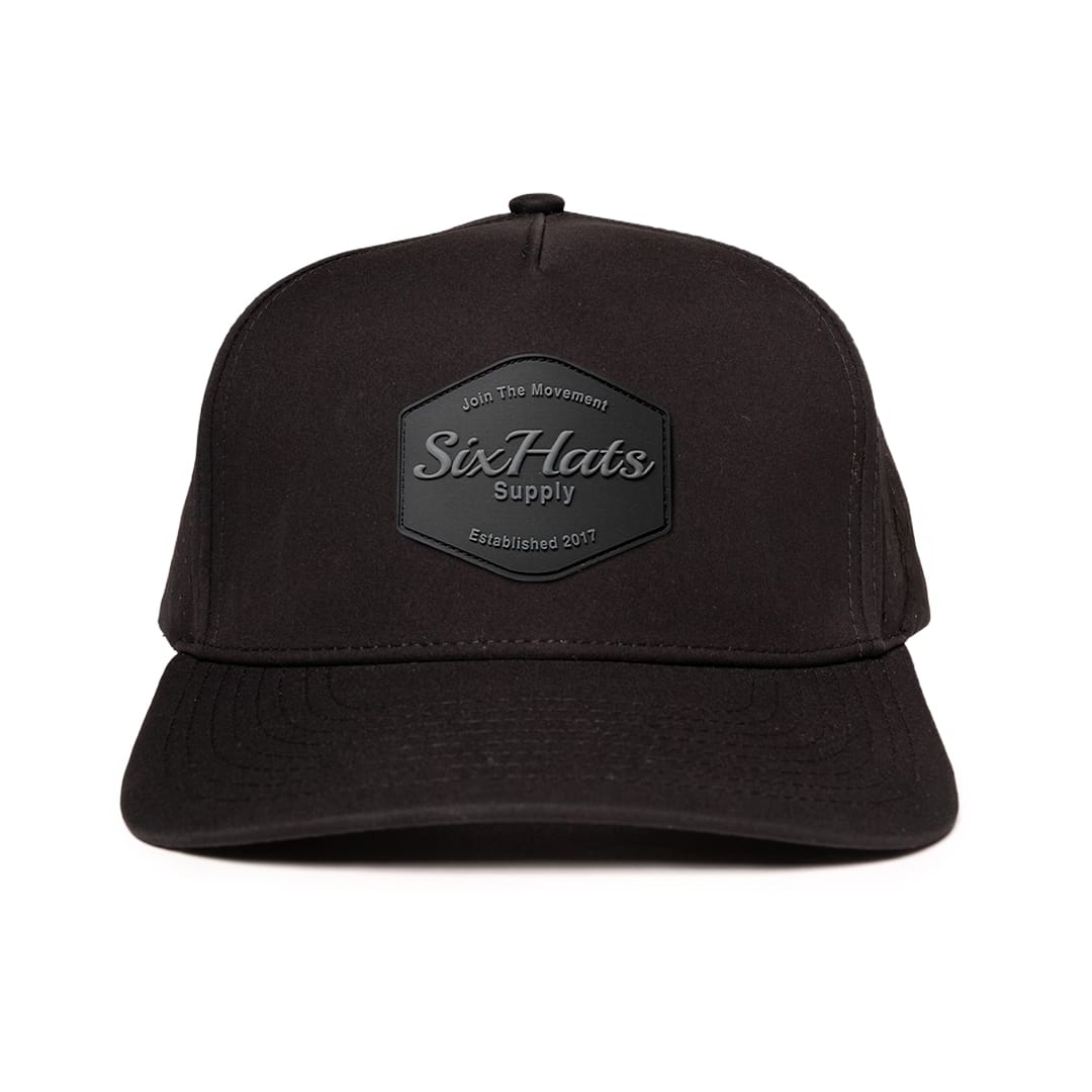 Black signature baseball cap with hex black rubber patch waterproof and sweat proof hats designed in canada